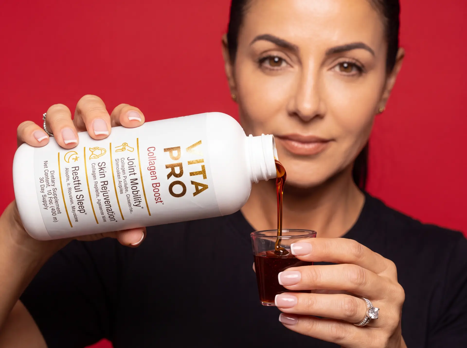 Woman pouring her nightly serving of VitaPro Collagen Boost
